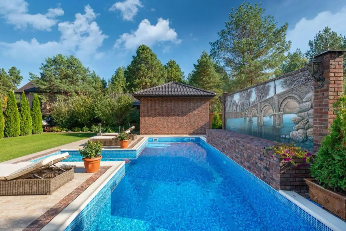 Backyard saltwater swimming pool in Anaheim, CA on a clear day
